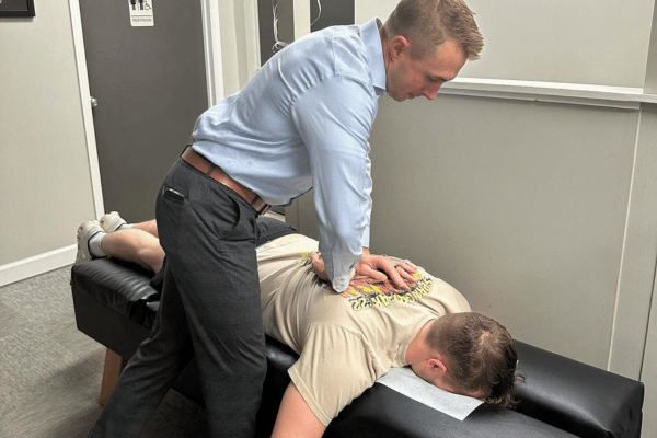 Dr Alex Is Giving Chiropractic Treatment For Back Pain